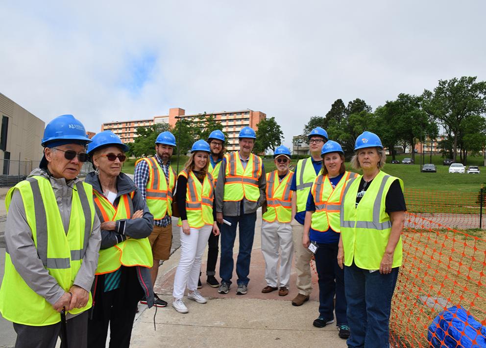 photo of hardhat tour group outside Integrated Science Building